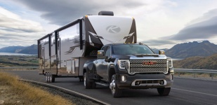 Тяжелый пикап GMC Sierra HD для буксировки больших прицепов, жилых модулей и домов на колесах, устройство, особенности конструкции, обзор